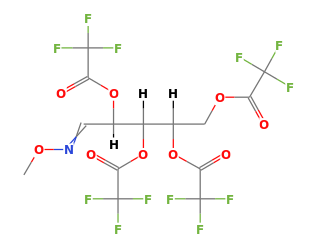 C14H9F12NO9